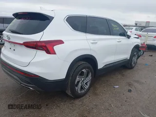 2023 Hyundai Santa Fe SE with VIN 5NMS14AJ3PH637561, listed as a IAAI auction lot 41905620 with 5,937 mi miles and . Bid and sale history available at DreamBid. Image 4.