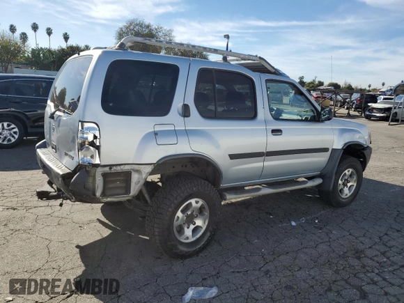 2001 Nissan Xterra XE z VIN 5N1ED28T51C513390, wystawiony jako Copart lot #85260414 z przebiegiem 218 377 mil mil oraz Szkoda całkowita • Salvage title. Historia ofert i sprzedaży dostępna na DreamBid. Obrazek 3.