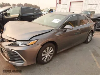 2021 Toyota Camry Hybrid LE with VIN 4T1C31AKXMU557387, listed as a IAAI auction lot 41295815 with 55,546 mi miles. Bid and sale history available at carsss.com. Image 16.