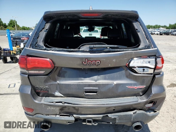 2020 Jeep Grand Cherokee Trailhawk с VIN 1C4RJFLT8LC177606, выставлен на аукционе Copart как лот 61678385 с пробегом 127 421 миль миль и Списание • Salvage title. История ставок и продаж доступна на DreamBid. Изображение 6.
