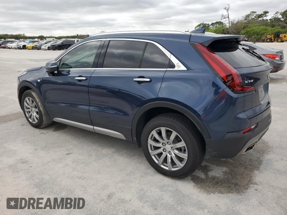 2021 Cadillac XT4 FWD Premium Luxury z VIN 1GYFZCR48MF056210, wystawiony jako Copart lot #45818245 z przebiegiem Nie podano mil oraz Nie do naprawy • Non repairable. Historia ofert i sprzedaży dostępna na DreamBid. Obrazek 2.