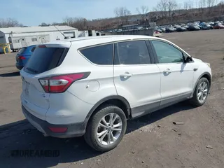 2017 Ford Escape SE with VIN 1FMCU9GD4HUB55262, listed as a IAAI auction lot 41792973 with 98,407 mi miles. Bid and sale history available at carsss.com. Image 4.