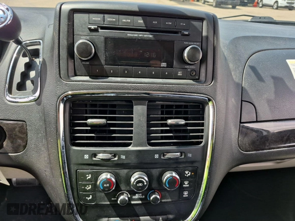 2014 Dodge Grand Caravan American Value with VIN 2C4RDGBG6ER235997, listed as a IAAI auction lot 42239630 with 120,807 mi miles and . Bid and sale history available at DreamBid. Image 27.