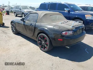 2006 Mazda MX-5 Miata Sport with VIN JM1NC25F860115878, listed as a IAAI auction lot 42842757 with 81,777 mi miles and . Bid and sale history available at DreamBid. Image 3.