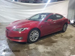 2017 Tesla Model S 100D with VIN 5YJSA1E20HF169714, listed as a Copart auction lot 49087055 with 105,246 mi miles and Salvage Title. Bid and sale history available at carsss.com. Image 1.