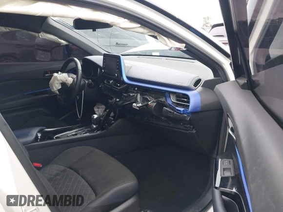 2020 Toyota C-HR LE with VIN JTNKHMBX9L1092934, listed as a IAAI auction lot 42021972 with 56,777 mi miles and . Bid and sale history available at DreamBid. Image 5.