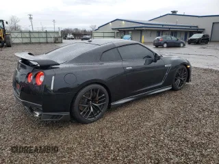 2009 Nissan GT-R Premium z VIN JN1AR54F19M250958, wystawiony jako Copart lot #51364685 z przebiegiem 59 437 mil mil oraz Szkody całkowita. Historia ofert i sprzedaży dostępna na DreamBid. Obrazek 3.