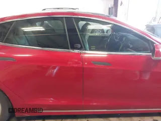 2016 Tesla Model S 90D with VIN 5YJSA1E24GF141543, listed as a IAAI auction lot 42045333 with Not Provided miles and . Bid and sale history available at DreamBid. Image 13.