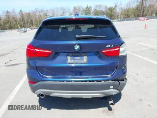 2017 BMW X1 xDrive28i with VIN WBXHT3C39H5F71525, listed as a IAAI auction lot 42050272 with 118,875 mi miles. Bid and sale history available at carsss.com. Image 15.