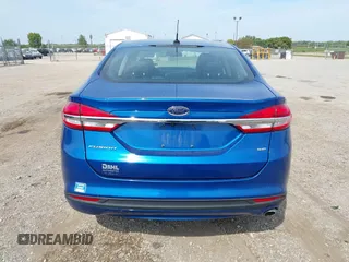 2017 Ford Fusion SE z VIN 3FA6P0H78HR195208, wystawiony jako IAAI lot #40384232 z przebiegiem 166 927 mil mil oraz . Historia ofert i sprzedaży dostępna na DreamBid. Obrazek 16.