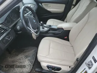 2013 BMW 3 Series 320i xDrive with VIN WBA3C3C59DF981328, listed as a Copart auction lot 57132395 with 152,458 mi miles and Salvage title. Bid and sale history available at DreamBid. Image 7.