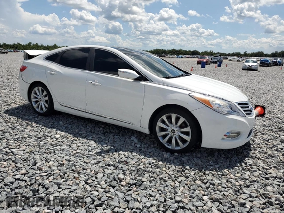 2013 Hyundai Azera z VIN KMHFH4JG4DA310590, wystawiony jako Copart lot #62472335 z przebiegiem 75 311 mil mil oraz Nie do naprawy • Non repairable. Historia ofert i sprzedaży dostępna na DreamBid. Obrazek 4.