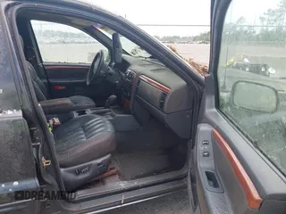 1999 Jeep Grand Cherokee Limited with VIN 1J4GW68N5XC702303, listed as a IAAI auction lot 42501995 with Not provided miles and . Bid and sale history available at DreamBid. Image 5.
