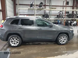 2014 Jeep Cherokee Latitude with VIN 1C4PJMCS0EW213826, listed as a IAAI auction lot 41322537 with 272,659 mi miles and . Bid and sale history available at DreamBid. Image 13.