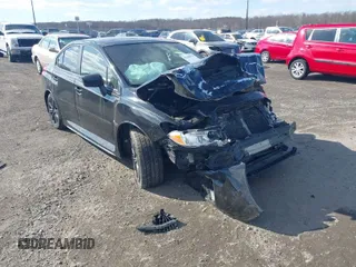 2015 Subaru WRX Premium with VIN JF1VA1D61F9823988, listed as a IAAI auction lot 41642433 with 27,517 mi miles. Bid and sale history available at carsss.com. Image 1.