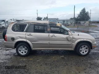 2001 Suzuki XL7 Standard z VIN JS3TX92VX14114699, wystawiony jako IAAI lot #41085552 z przebiegiem 195 316 mil mil oraz . Historia ofert i sprzedaży dostępna na DreamBid. Obrazek 14.