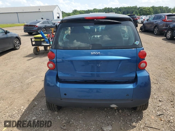 2009 Smart fortwo Pure with VIN WMEEJ31X59K218003, listed as a Copart auction lot 62413775 with 82,711 mi miles and Salvage title. Bid and sale history available at DreamBid. Image 6.