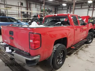 2018 Chevrolet Silverado 1500 LT with VIN 1GCRCREH4JZ164236, listed as a IAAI auction lot 41394225 with 64,639 mi miles and . Bid and sale history available at DreamBid. Image 4.