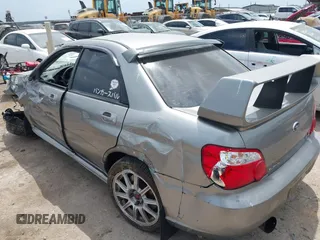 2007 Subaru Impreza WRX STI z VIN JF1GD76677L526227, wystawiony jako IAAI lot #42034710 z przebiegiem 93 767 mil mil oraz . Historia ofert i sprzedaży dostępna na DreamBid. Obrazek 3.