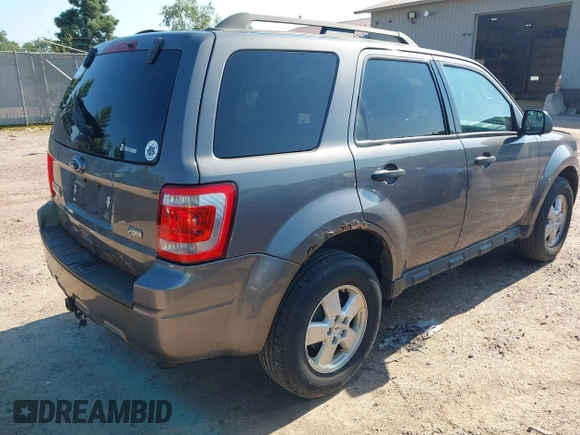 2012 Ford Escape XLT z VIN 1FMCU9DG7CKB28270, wystawiony jako IAAI lot #42607520 z przebiegiem 129 758 mil mil oraz . Historia ofert i sprzedaży dostępna na DreamBid. Obrazek 4.