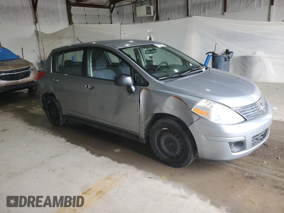 2009 Nissan Versa S with VIN 3N1BC13E59L499698, listed as a Copart auction lot 58242235 with 169,239 mi miles and Clean title. Bid and sale history available at DreamBid. Image 4.