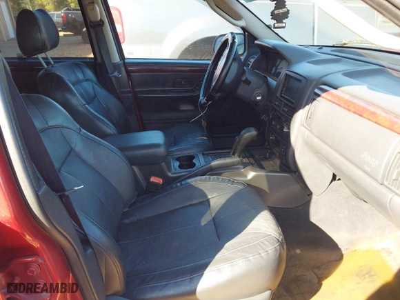 2004 Jeep Grand Cherokee Limited with VIN 1J4GW58N34C124515, listed as a IAAI auction lot 40602071 with 169,358 mi miles. Bid and sale history available at carsss.com. Image 5.