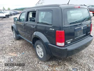 2011 Dodge Nitro SE z VIN 1D4PU2GK2BW506972, wystawiony jako IAAI lot #42402117 z przebiegiem 154 487 mil mil oraz . Historia ofert i sprzedaży dostępna na DreamBid. Obrazek 3.