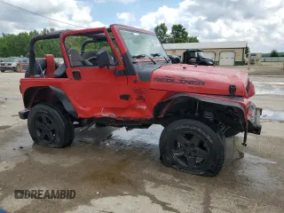 2000 Jeep Wrangler SE with VIN 1J4FA29P6YP793045, listed as a Copart auction lot 58756715 with 202,110 mi miles and Salvage title. Bid and sale history available at DreamBid. Image 4.