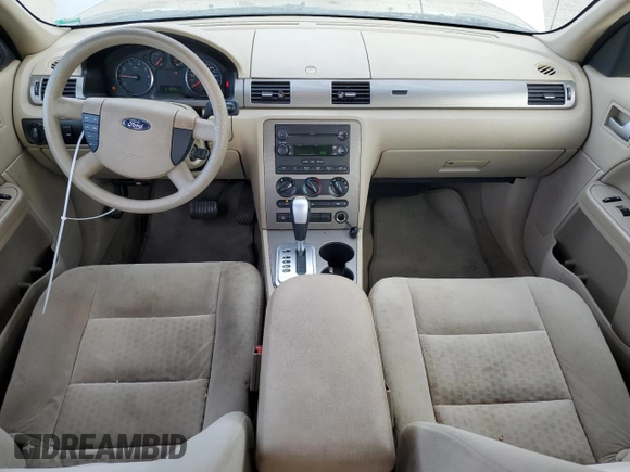 2005 Ford Five Hundred SE with VIN 1FAFP26135G148147, listed as a Copart auction lot 84011184 with 216,546 mi miles and Salvage Title. Bid and sale history available at carsss.com. Image 8.