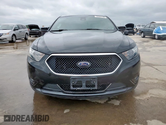 2014 Ford Taurus SHO z VIN 1FAHP2KT4EG106957, wystawiony jako Copart lot #59364185 z przebiegiem 113 704 mil mil oraz Szkoda całkowita • Salvage title. Historia ofert i sprzedaży dostępna na DreamBid. Obrazek 5.