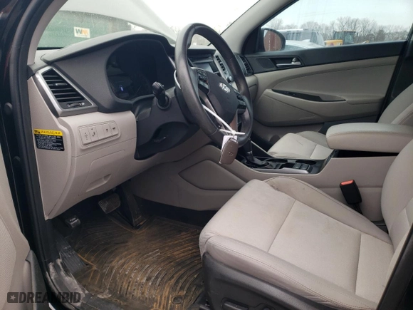 2017 Hyundai Tucson Value with VIN KM8J33A20HU365498, listed as a Copart auction lot 89315085 with 99,713 mi miles and Salvage Title. Bid and sale history available at carsss.com. Image 7.