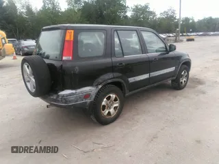 2001 Honda CR-V LX z VIN JHLRD18431C056123, wystawiony jako IAAI lot #42501415 z przebiegiem 156 190 mil mil oraz . Historia ofert i sprzedaży dostępna na DreamBid. Obrazek 4.