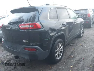 2016 Jeep Cherokee Latitude with VIN 1C4PJMCB0GW360103, listed as a IAAI auction lot 40788185 with 132,894 mi miles. Bid and sale history available at carsss.com. Image 4.