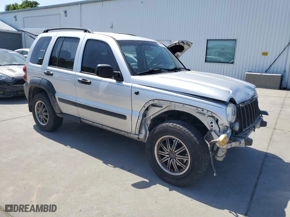 2005 Jeep Liberty Sport with VIN 1J4GK48K95W682154, listed as a Copart auction lot 52176155 with 164,743 mi miles and Salvage Title. Bid and sale history available at carsss.com. Image 4.