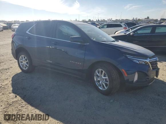 2022 Chevrolet Equinox LT with VIN 3GNAXKEV4NL295878, listed as a Copart auction lot 72569234 with 14,493 mi miles and Salvage Title. Bid and sale history available at DreamBid. Image 4.