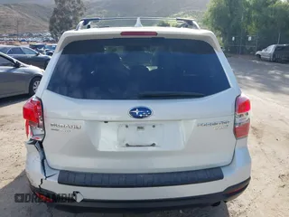 2016 Subaru Forester Touring with VIN JF2SJAXC7GH565287, listed as a IAAI auction lot 41947083 with 126,563 mi miles and . Bid and sale history available at DreamBid. Image 16.