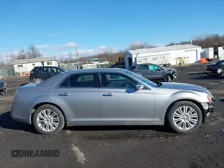 2014 Chrysler 300 C with VIN 2C3CCAKG2EH273274, listed as a IAAI auction lot 41638665 with 164,888 mi miles and . Bid and sale history available at carsss.com. Image 13.