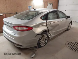 2015 Ford Fusion SE Hybrid with VIN 3FA6P0LU4FR151040, listed as a IAAI auction lot 41376155 with 120,486 mi miles. Bid and sale history available at carsss.com. Image 4.