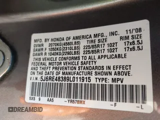 2009 Honda CR-V LX with VIN 5J6RE48389L011915, listed as a IAAI auction lot 41301796 with 214,807 mi miles. Bid and sale history available at carsss.com. Image 9.