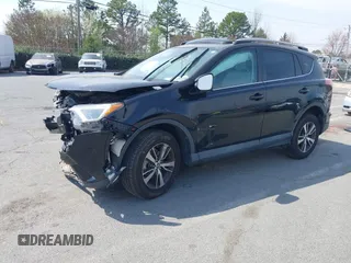 2018 Toyota RAV4 XLE with VIN 2T3RFREV6JW734993, listed as a IAAI auction lot 41790232 with 61,118 mi miles. Bid and sale history available at carsss.com. Image 2.
