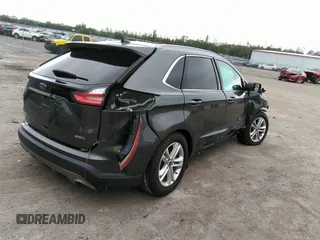 2020 Ford Edge SEL z VIN 2FMPK3J90LBB51006, wystawiony jako IAAI lot #41841354 z przebiegiem Nie podano mil oraz . Historia ofert i sprzedaży dostępna na DreamBid. Obrazek 4.