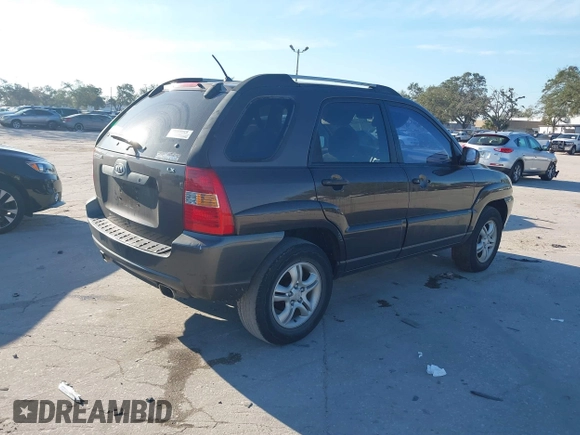 2005 Kia Sportage LX z VIN KNDJF723757132772, wystawiony jako IAAI lot #41436925 z przebiegiem 134 653 mil mil oraz . Historia ofert i sprzedaży dostępna na DreamBid. Obrazek 4.