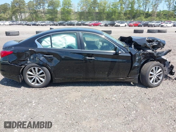 2015 Infiniti Q50 Premium z VIN JN1BV7AR4FM410949, wystawiony jako IAAI lot #42243917 z przebiegiem 56 552 mil mil oraz . Historia ofert i sprzedaży dostępna na DreamBid. Obrazek 13.