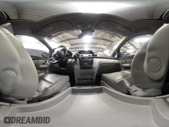 2014 Honda Odyssey Touring with VIN 5FNRL5H94EB105745, listed as a IAAI auction lot 41744012 with 77,032 mi miles and . Bid and sale history available at DreamBid. Image 18.