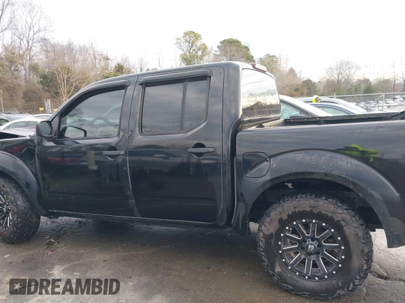 2014 Nissan Frontier SV with VIN 1N6AD0ER9EN715608, listed as a IAAI auction lot 41306919 with 181,107 mi miles and . Bid and sale history available at DreamBid. Image 14.