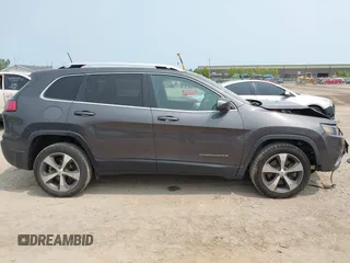 2020 Jeep Cherokee Limited z VIN 1C4PJLDB3LD614479, wystawiony jako IAAI lot #42363037 z przebiegiem 100 767 mil mil oraz . Historia ofert i sprzedaży dostępna na DreamBid. Obrazek 14.