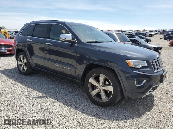 2016 Jeep Grand Cherokee Overland with VIN 1C4RJFCG9GC338165, listed as a Copart auction lot 54125815 with 102,302 mi miles and Salvage title. Bid and sale history available at DreamBid. Image 4.