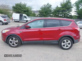 2014 Ford Escape SE z VIN 1FMCU0GX3EUC64328, wystawiony jako IAAI lot #42182502 z przebiegiem 135 496 mil mil oraz . Historia ofert i sprzedaży dostępna na DreamBid. Obrazek 14.