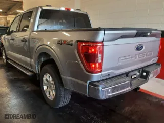 2021 Ford F-150 XL with VIN 1FTFW1E80MKE48231, listed as a IAAI auction lot 41943230 with 127,173 mi miles. Bid and sale history available at carsss.com. Image 1.