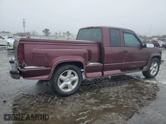 1995 GMC Sierra 1500 z VIN 2GTEK19K2S1542315, wystawiony jako Copart lot #42764275 z przebiegiem 305 402 mil mil oraz Szkody całkowita. Historia ofert i sprzedaży dostępna na DreamBid. Obrazek 3.